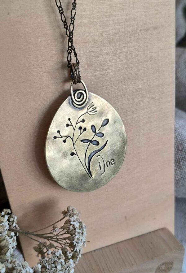 Collier spirale et nature en laiton