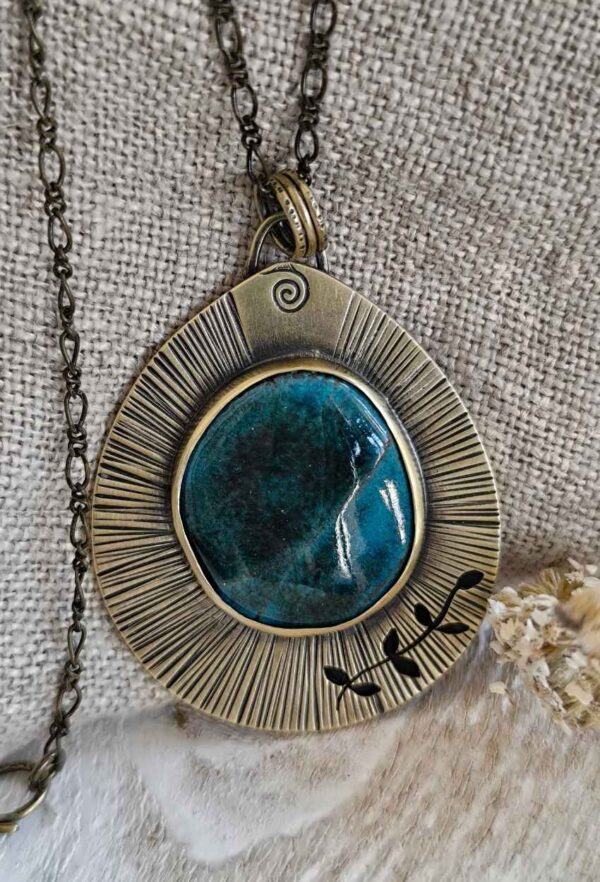 Collier spirale et nature en laiton