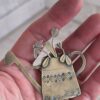 Bijou broche arrosoir en laiton