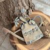 Bijou broche arrosoir en laiton
